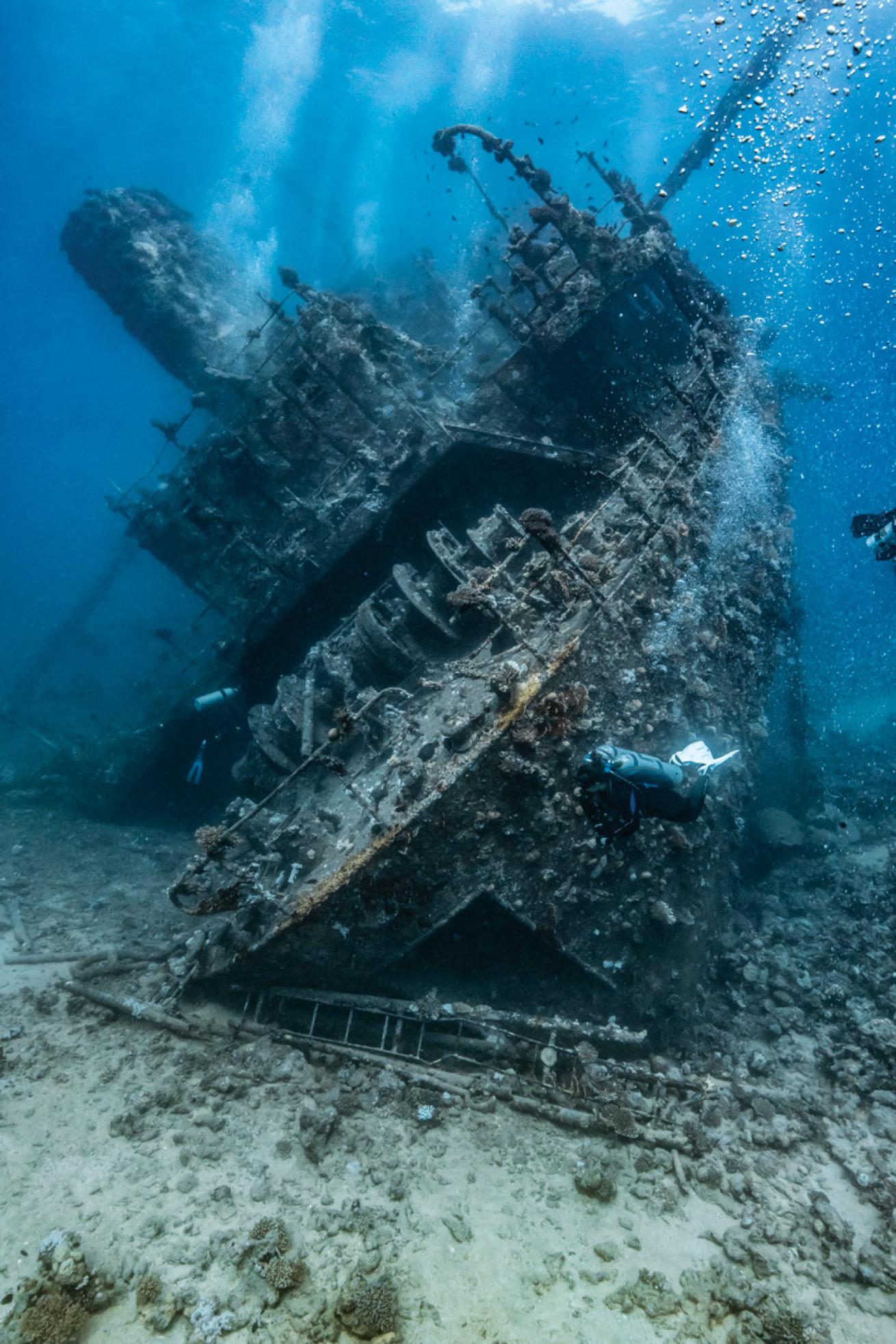 a tech diver explores the stern of the Giannis D wreck