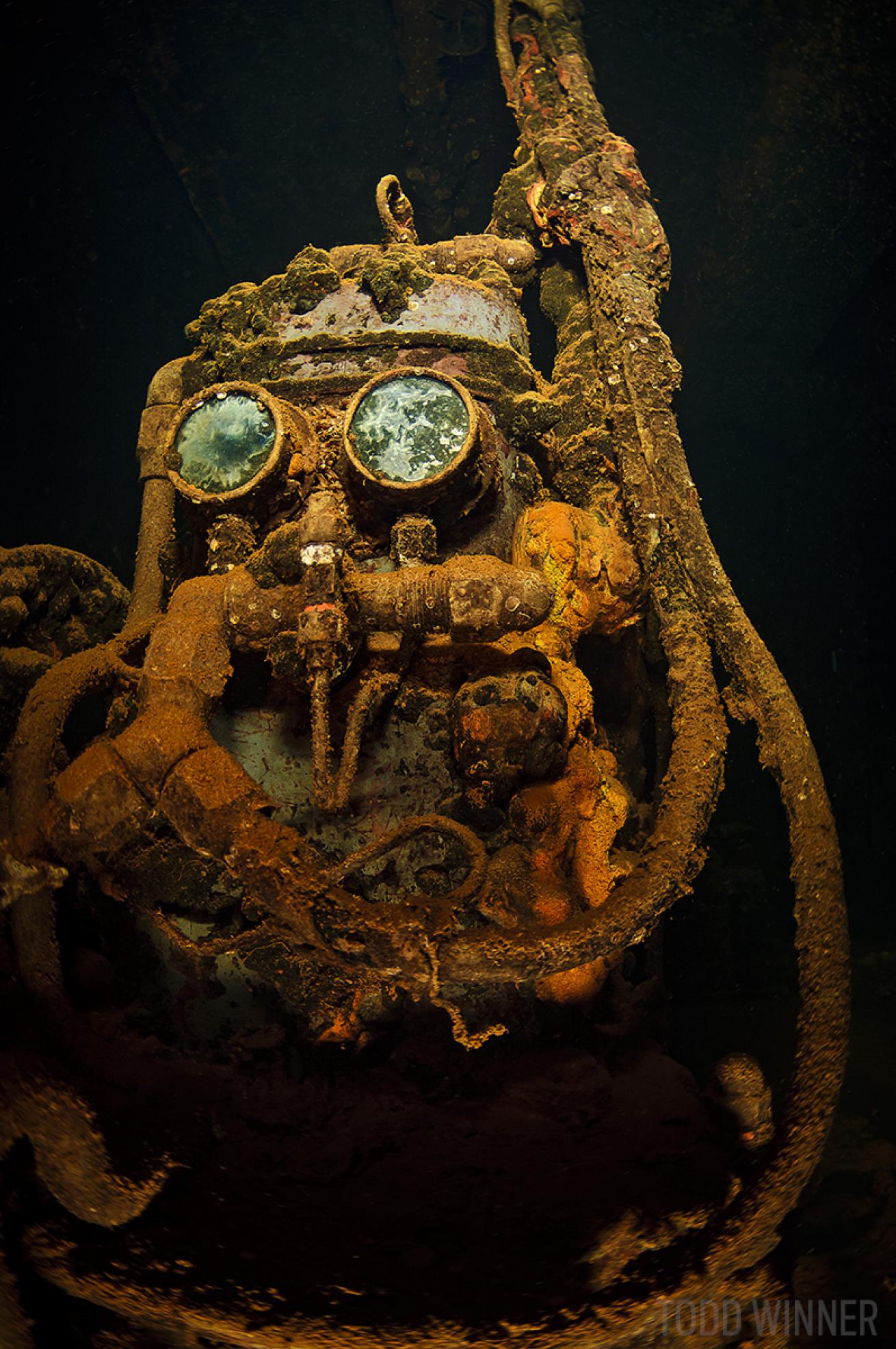 Fujikawa Maru mask underwater in Truk Lagoon, Chuuk