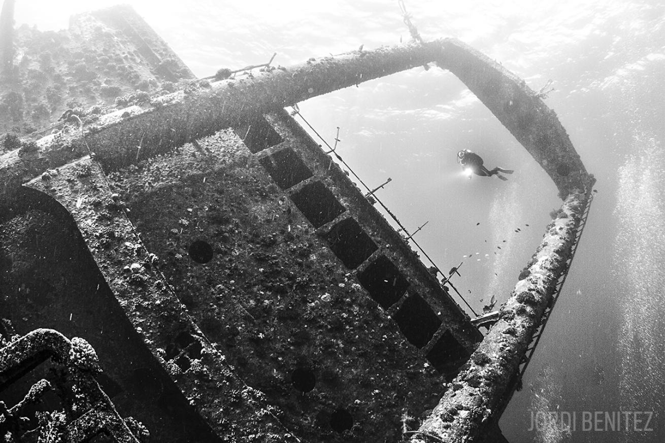 Giannis D shipwreck and diver underwater in the Red Sea