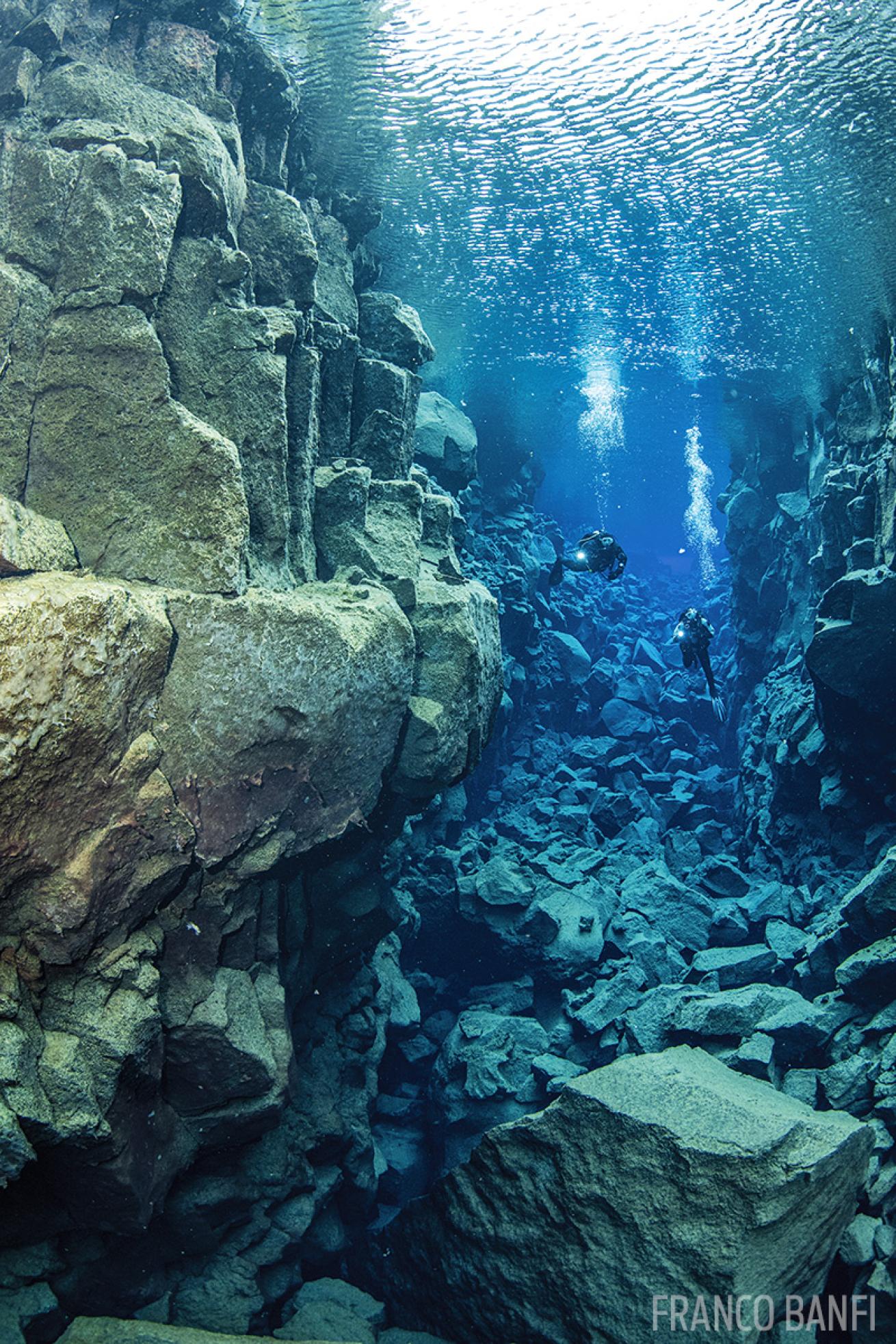 Scuba divers at Davíðsgjá Iceland