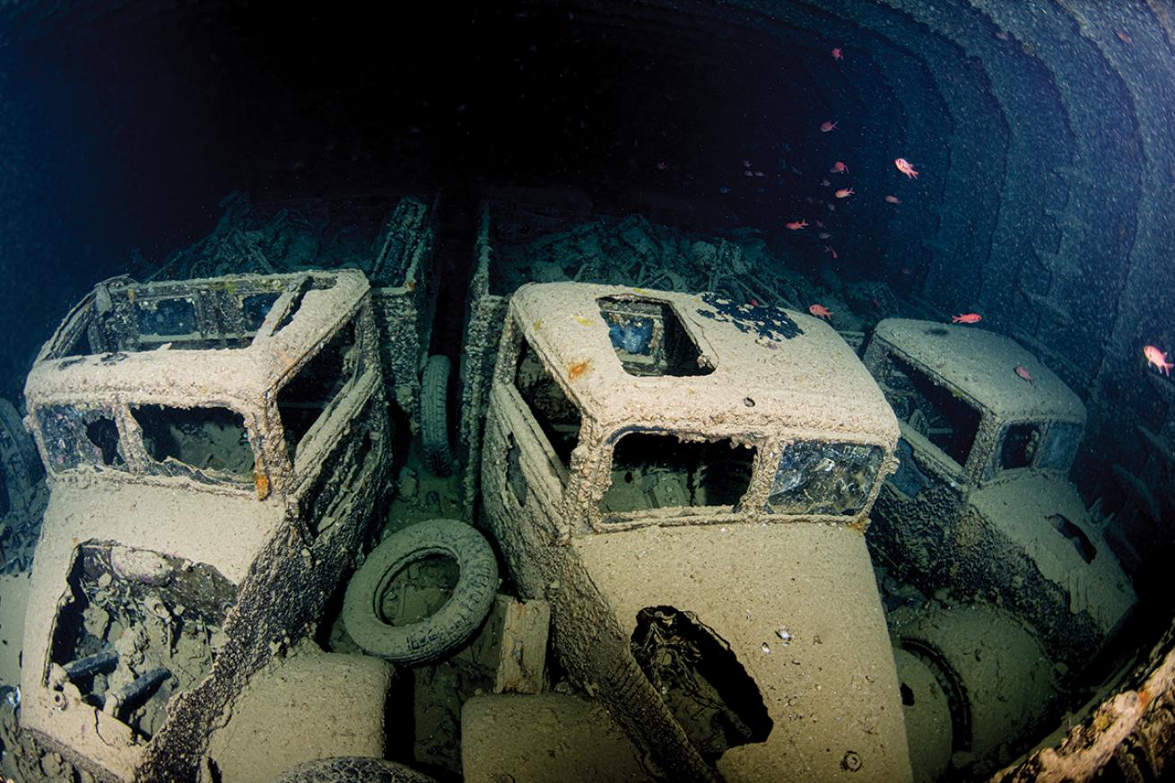 Thistlegorm wreck hull full of cars