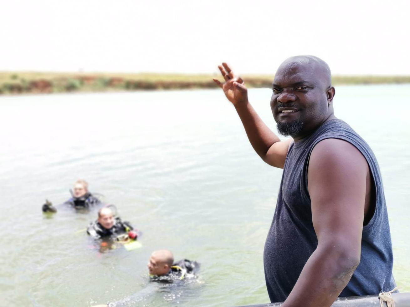 Mutumba Faisal and his divers set out to clean Lake Victoria.