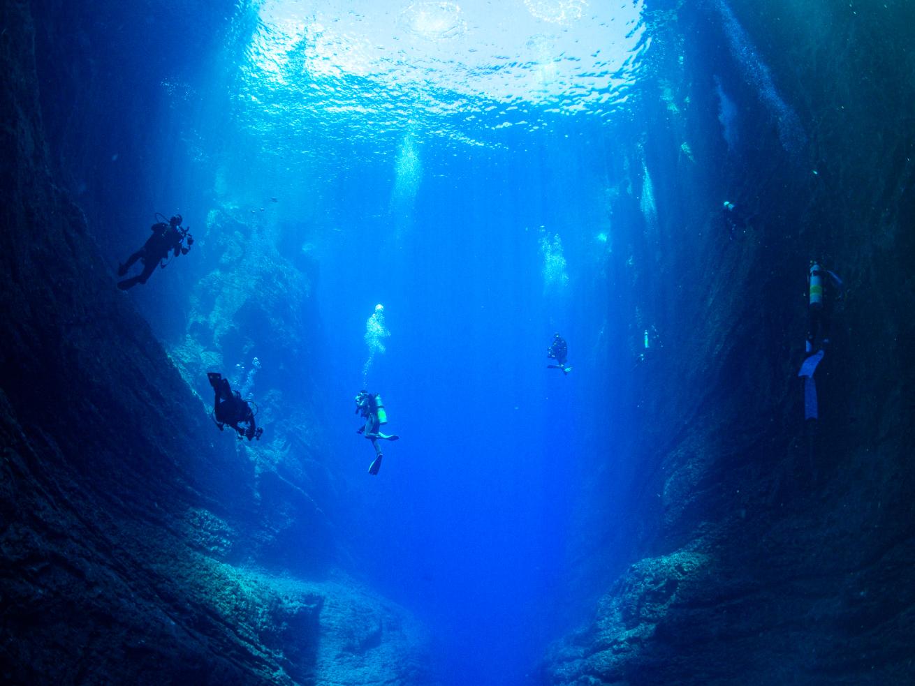 Divers in a cave in Ni’ihau Island.