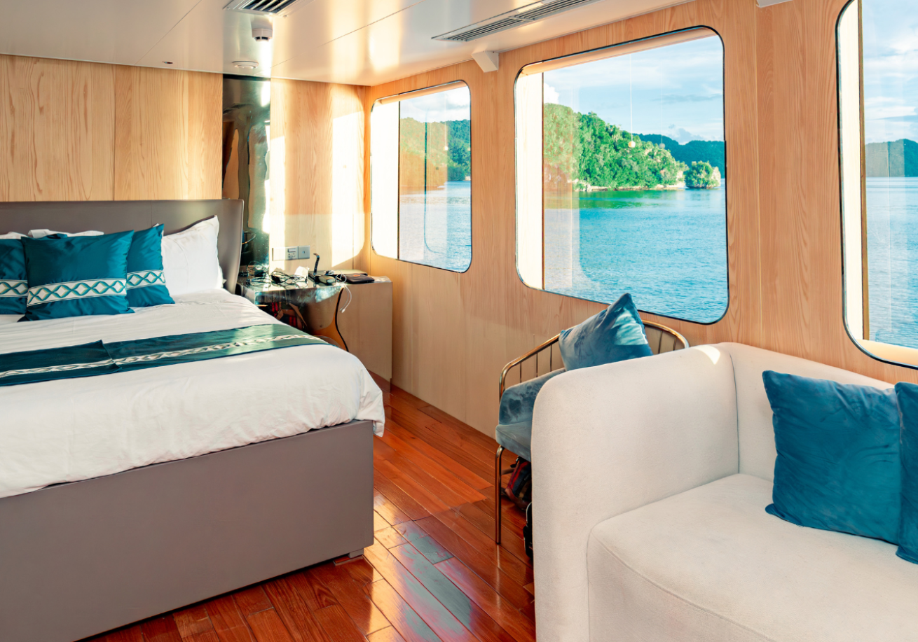 Liveaboard cabin with a bed and a couch