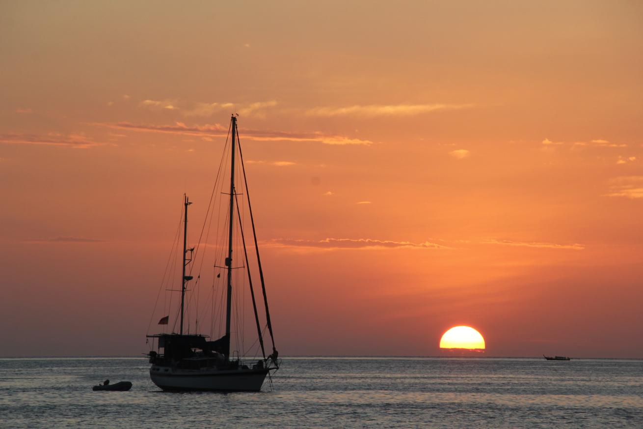 A picturesque sunset viewed from shore.